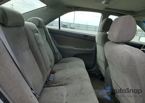 2003 Toyota Camry Le from USA, damaged, VIN JTDBE32KX30177458